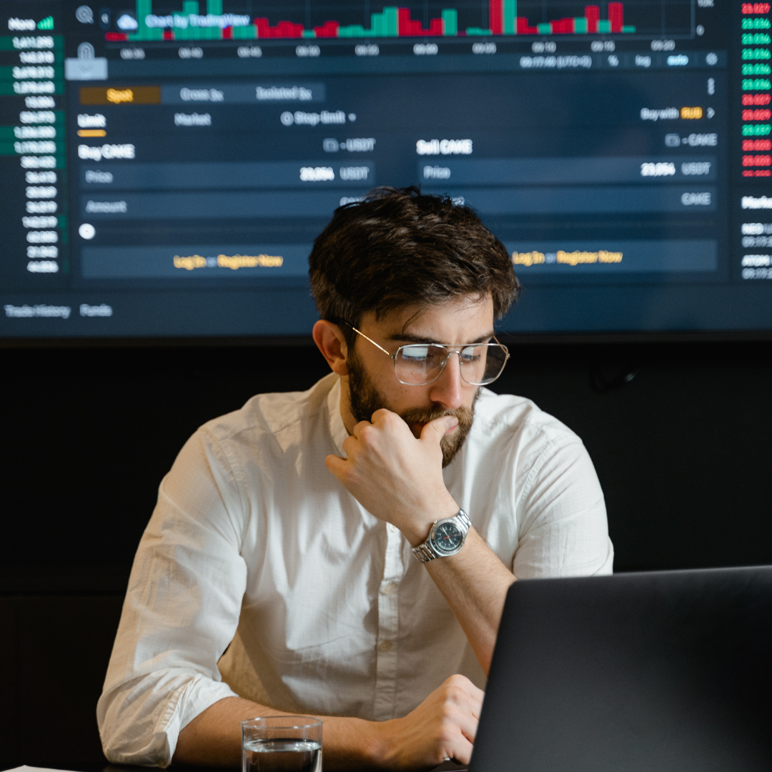 An executive looking at his computer screen